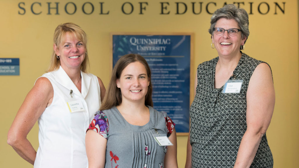 North Haven teachers, from left, Lauretta Dowling, Zoe Madden and Lisa Ball-Goodrich, recently participated in a Quinnipiac University program to enhance their lessons using the Next Generation Science Standards. (Autumn Driscoll /Quinnipiac University).